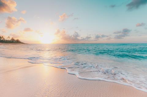 image of sunset by the ocean